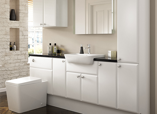 white bathroom furniture with contrasting black surfaces designed by wet room specialists